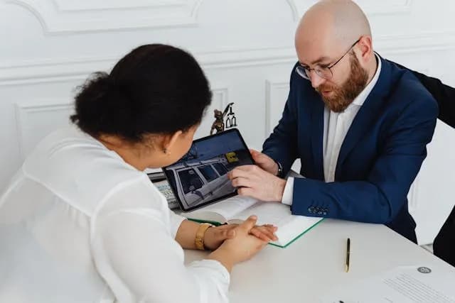 a lawyer talking to a client